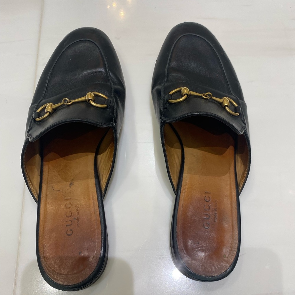 Gucci Black Leather Loafers with Gold Accents